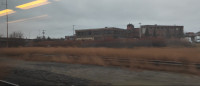 A closer view of the HP Hood plant, taken from Wickford Junction bound MBTA Train № 815