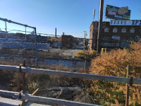 Looking across the Northeast Corridor to the site of Dike St Station