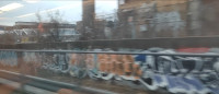A view of the Dike Street Station Site from southbound MBTA Train № 815