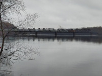 A freight train, CSO-3, crosses the HP&F bridge between East Hartford and Hartford