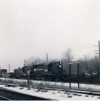 A photo taken by my father, Bernard Dowd, of Penn Central trains at Newington in the 1970s.
