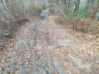 A structure in the roadbed, just west of Providence Road