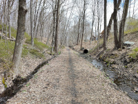 It becomes clear that the ditches alongside the trail are part of the local storm sewer system