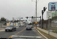 Looking west along Hamilton St in Hartford. The Hartford Line rail crossing is at front, the CTfastrak crossing is behind