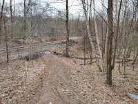 Looking north across the tracks to Pequabuck Tunnel and the loop