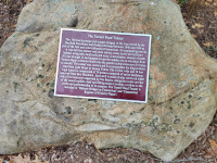A plaque explaining the tunnel's history