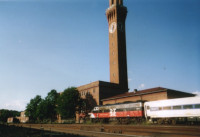 A view of a CDOT FL9 and coaches with  Waterbury Union Station