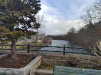 Looking East on the Willimantic River from the former Windham Road Bridge. Willimantic Linen Company Mill  № 2 is on the north side of the river; the tracks are on the south side