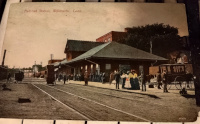 A c.1909 postcard showing the depot in front of 760 Main Street
